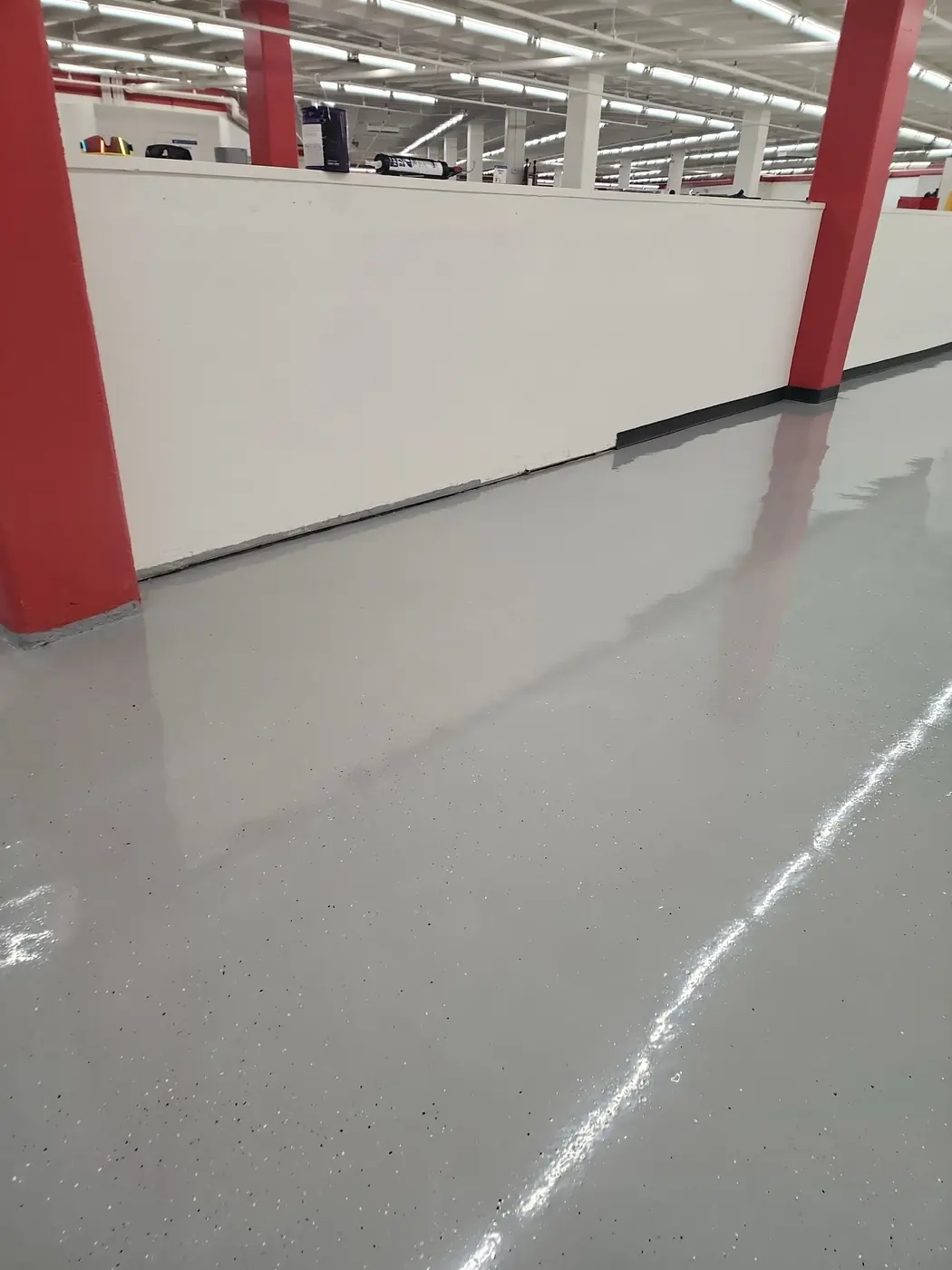 Salvation Army Kailua epoxy floor: long view across the retail floor showing even finish