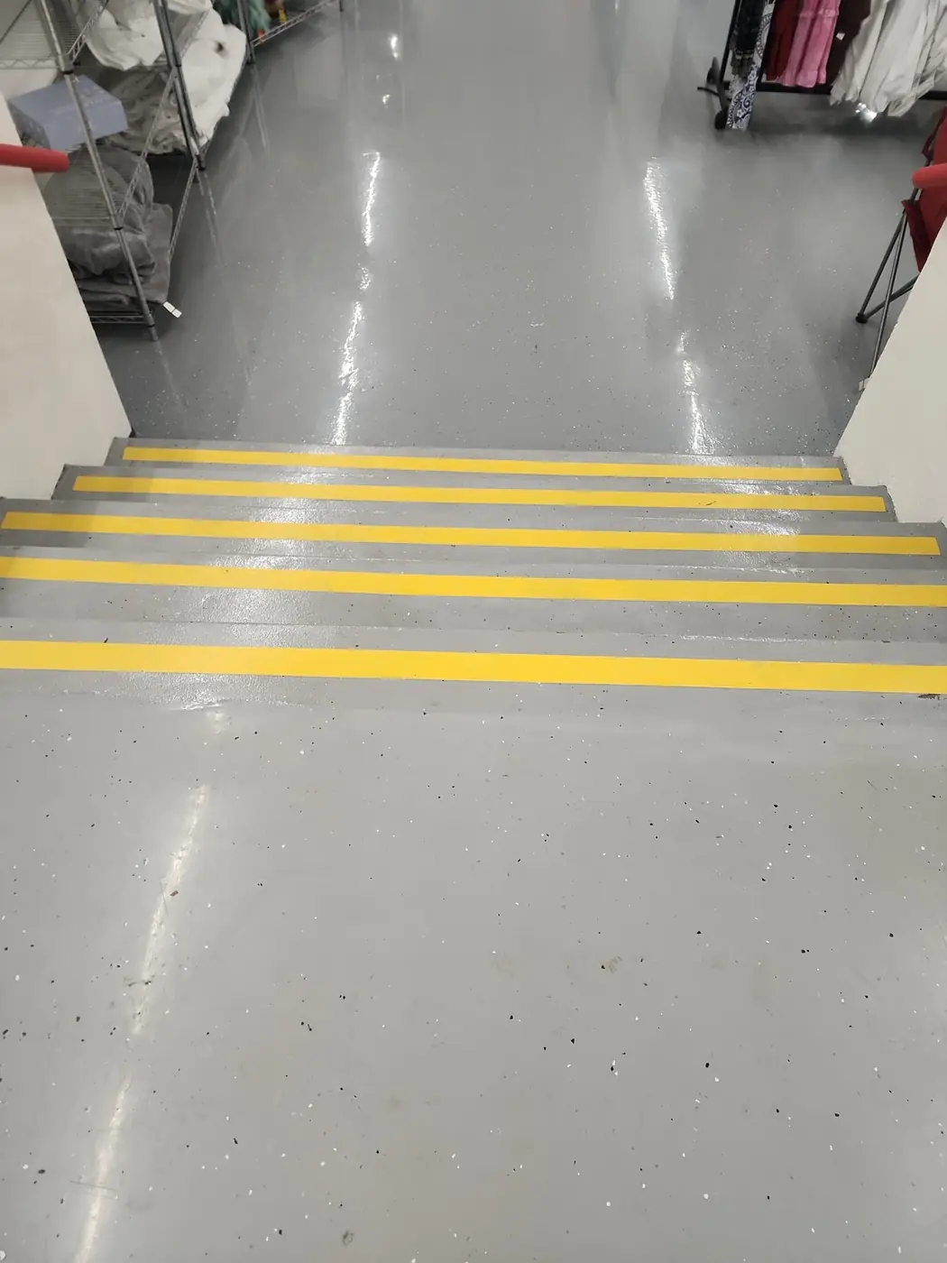 Salvation Army Kailua epoxy floor: detail of the finished surface with crisp wall lines